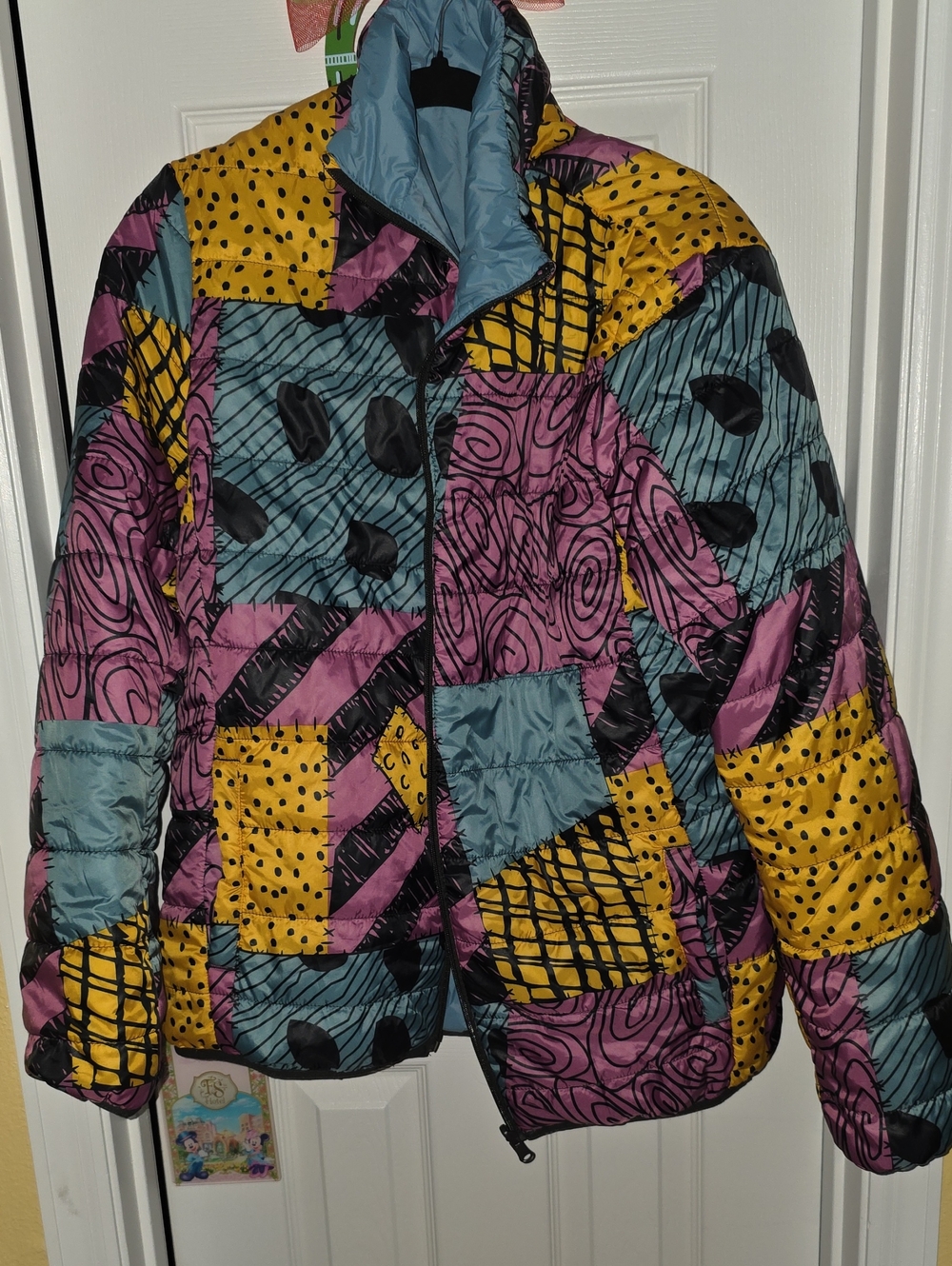 A Nightmare Before Christmas "Sally" Colorblock Patchwork Puffer Jacket.